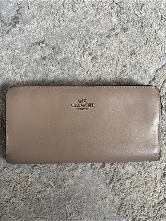 Coach Handbags - Coach Taupe Zip-Around Leather Wallet with Silver Logo lots of wear see pics.